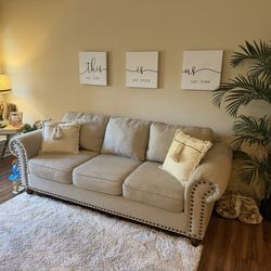 Light Tan, Ashley Furniture Couch With Throw Pillows And Rug In Great Shape