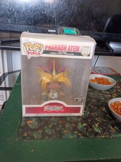 Pop figure with plastic protector.