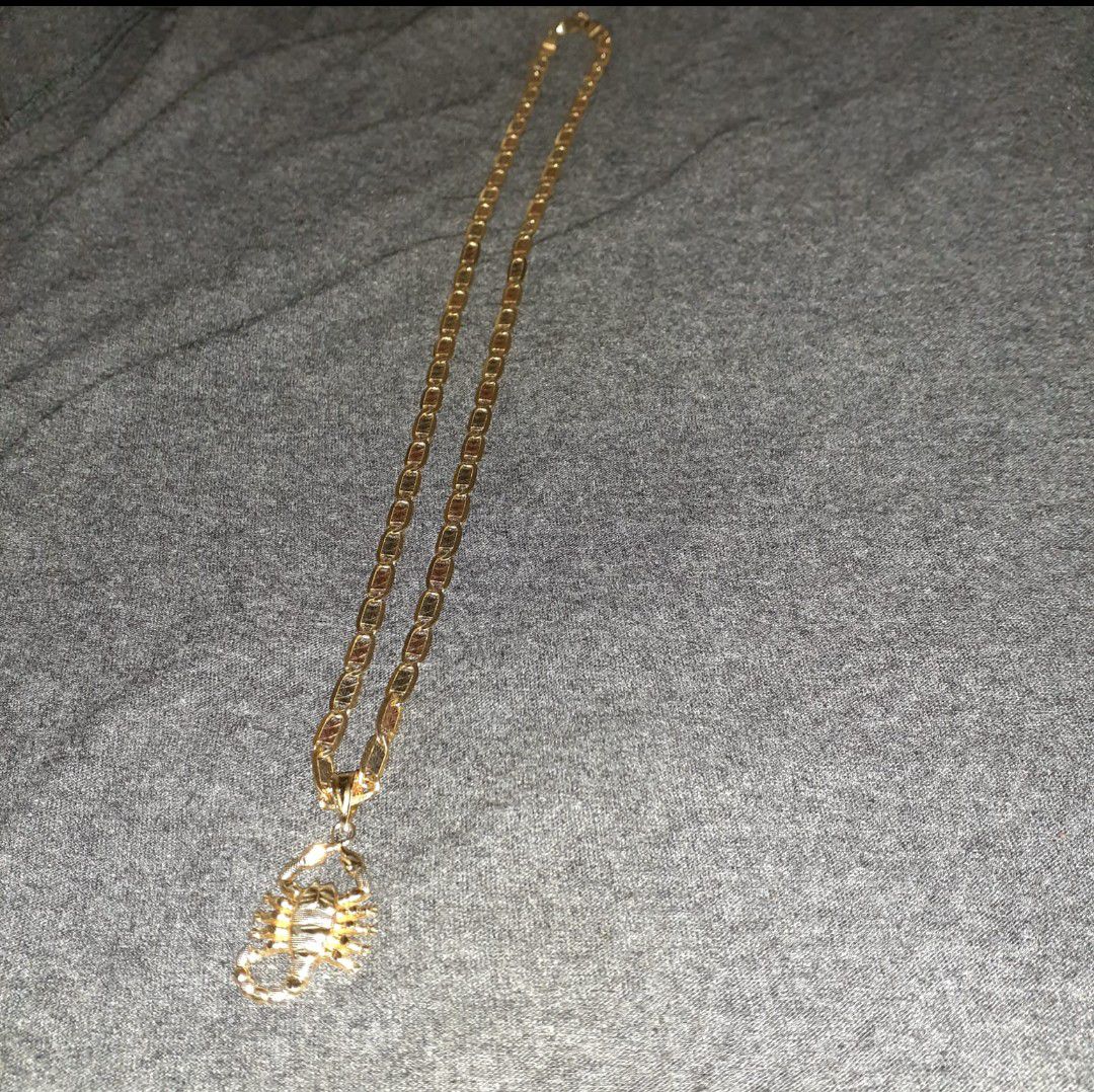14K gold chain, 22 long, asking $1,200, cadena de oro de 14 kilates, 22 de largo, 24 gramos, pido $1,200