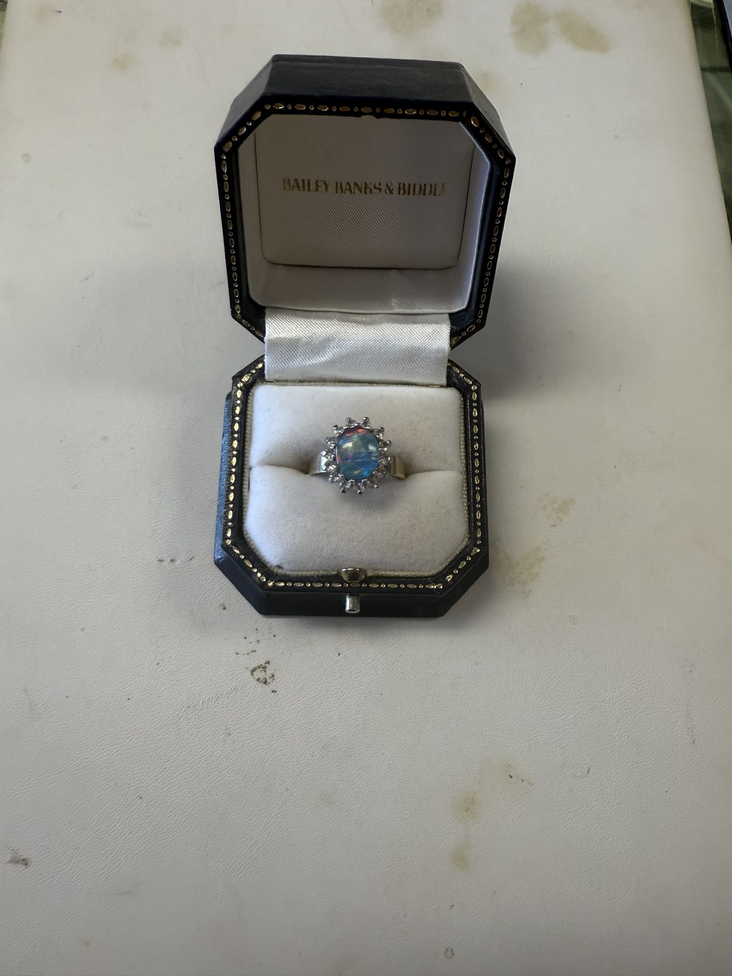 Woman’s Opal And Diamond Ring