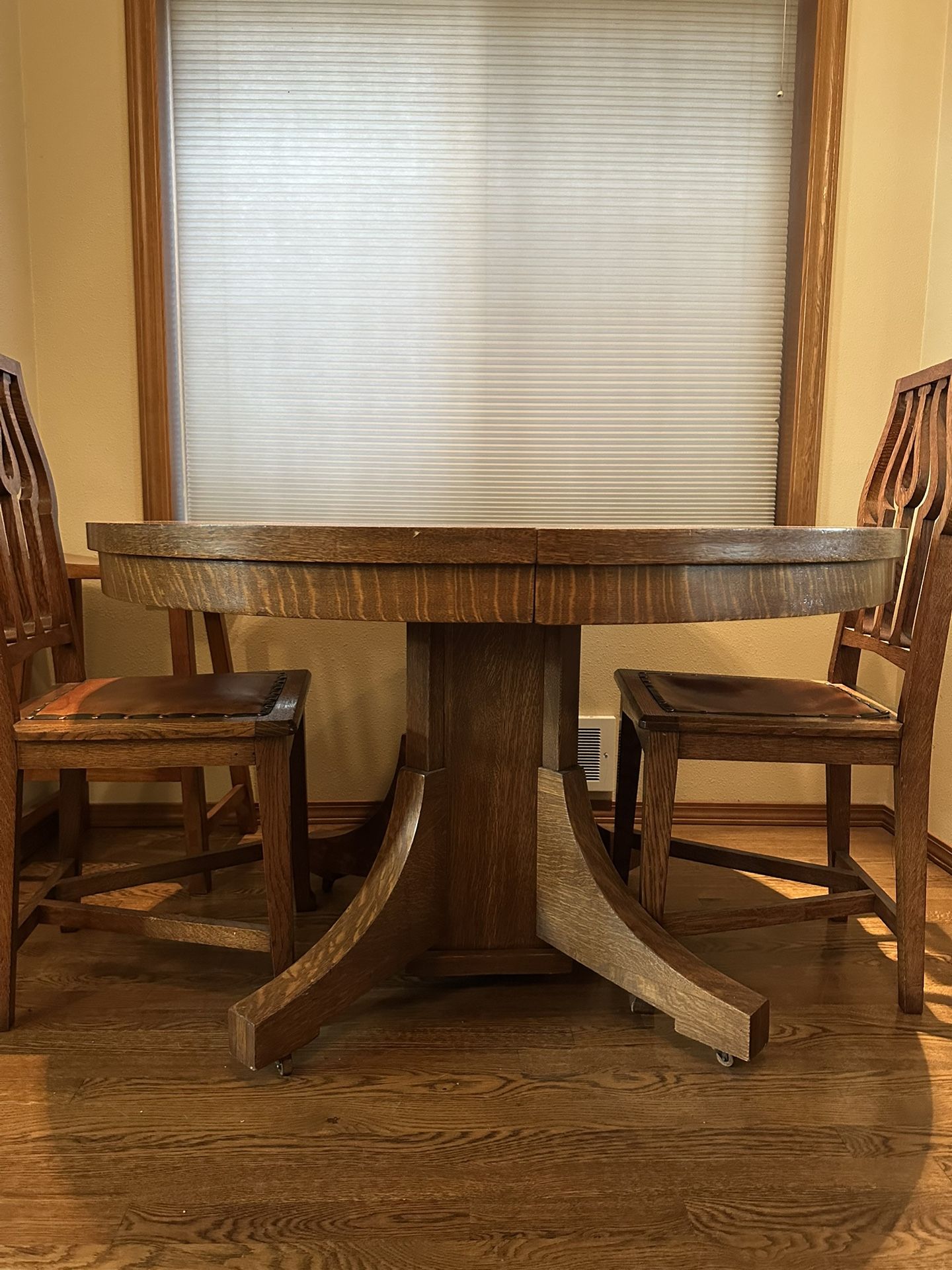 Antique dining table and chairs