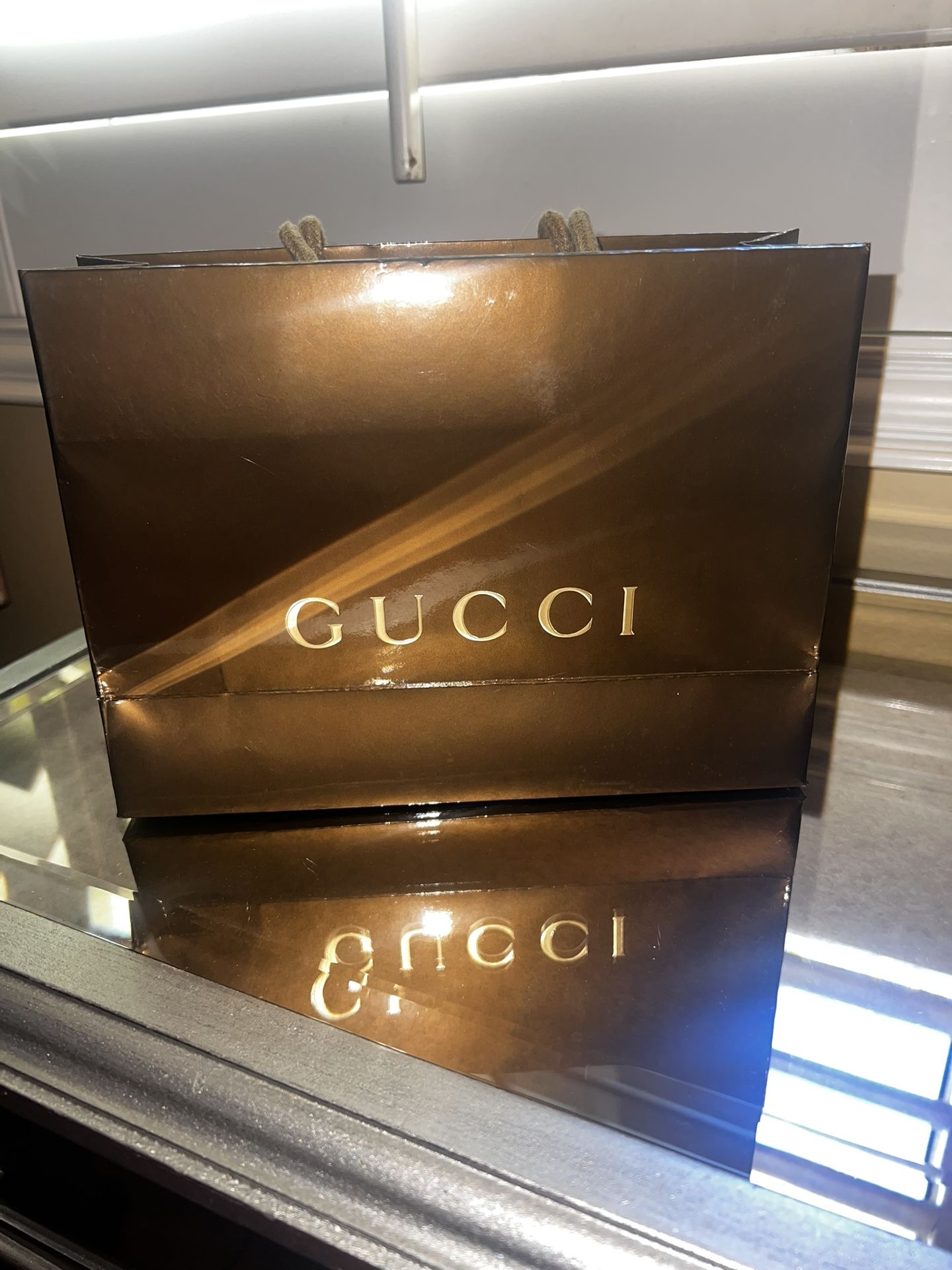Gucci Gift Bag (size: 9”x6.5”x3”)
