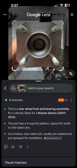 This is a rear wheel hub and bearing assembly for a vehicle, likely for a Nissan Sentra (2007-2012).The part has a 4-lug bolt pattern, typical for sma
