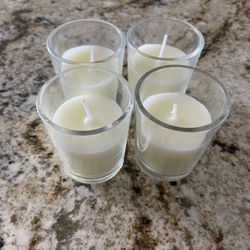4 Votive Candles In Clear Glass Jars 
