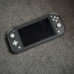 Nintendo Switch Lite w/ Charger