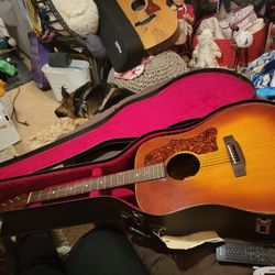 Vintage early 1970s Gibsons J45 deluxe Acoustic Guitar #A302908 with original case.