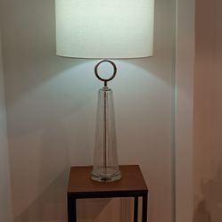 Set Of 2 Unique Tall Table Lamps By Uttermost With The Hand blown Transparent Glass  Base And  Chrome Trim H32"