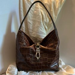 Dooney and Bourke Elegant Brown Florentine embossed Bag