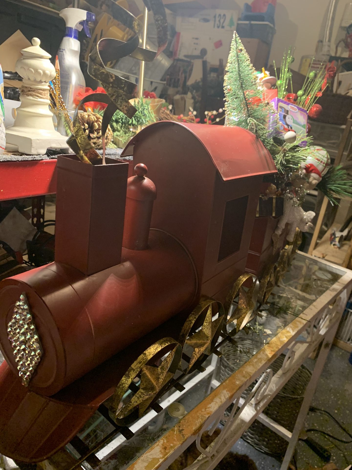 Christmas train filled with all the toys for the girls and the boys! This one of a kind Christmas train is 2 feet long 4 inches wide and 12 inches tal