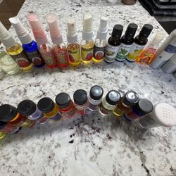Assorted fragrances  with partial fill  - includes air fresheners, body oil and burning oils 