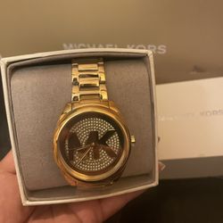 Michael Kors logo. Style #MK7088 Women's Janelle Gold-Tone Stainless Steel Bracelet Watch 42mm