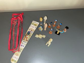 Egyptian characters in carrying case.