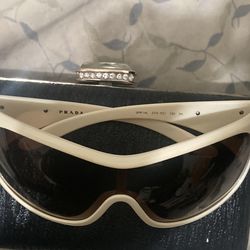 Prada SPR 14L ZVA-6S1 sunglasses,