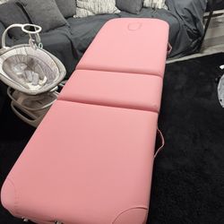 Pink massage table 