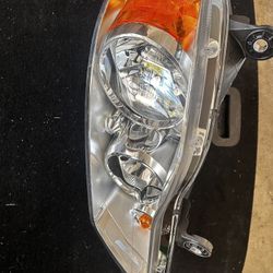 Replacement Headlight with bulbs on driver side - 2014 Chrysler Town & Country