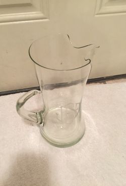 52 oz glass pitcher has J E E etched on front