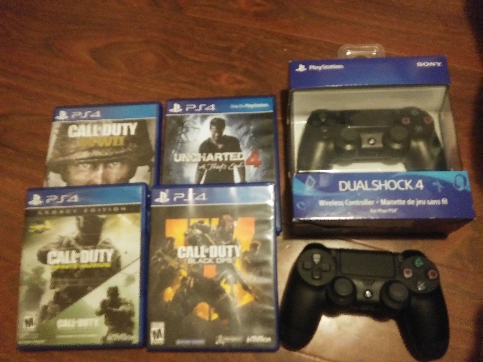 PlayStation, 2 controllers, headset, 12 month subscription, and a couple of vidoogames