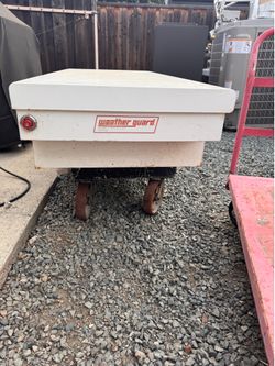 Weather guard , white saddle style storage box