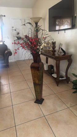 Metal base with flowers