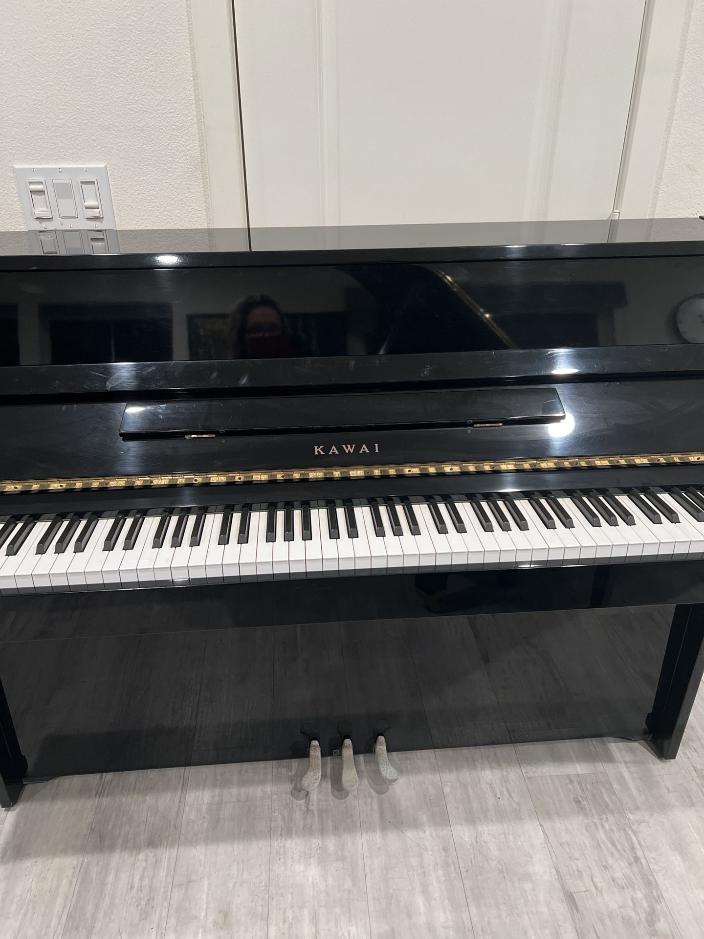 kawai. upright piano. gloss black. like new