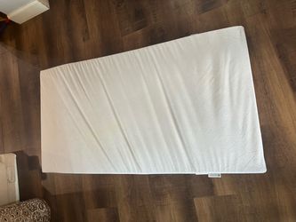 Infant crib mattress topper