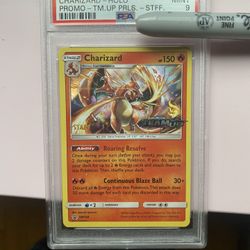 Charizard Staff PSA 9