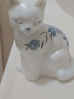 White Ceramic Cat Figurine with Blue Floral Design$45 cash
