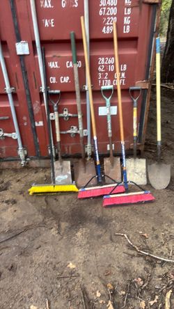 Shovels one round three square three shop brooms