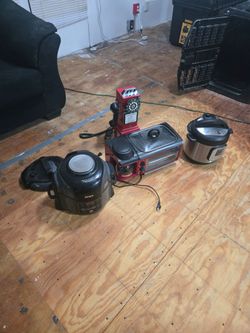 Brand new ninja cooker with another lid brand new Crock pot instapot brand new treat station and retro phone
