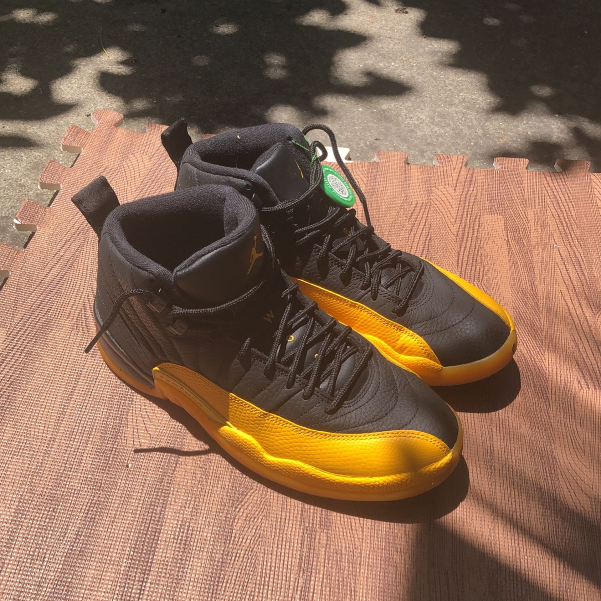 Black And Yellow Jordan 12’s