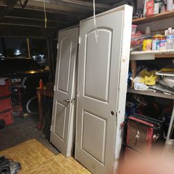 2 doors 1 is 24 inches by 80. The second 1 is 32 / 80 as in good condition.
