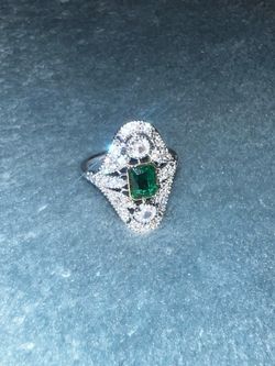 Lab white sapphire with lab green emerald ring