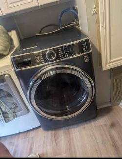 G.e gas dryer and washer machine. Less than a year old no issues! Everything works amazing! They just don't fit in my new homes laundry room and I don