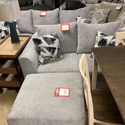 Brand new sofa and loveseat for $1200 cocktail ottoman $249