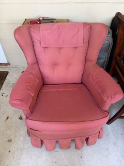 Pink Wingback Armchair with Ruffled Skirt