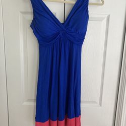Summer dress purchased at a boutique. Like new! Flowy bodice/ tight & flattering around chest.