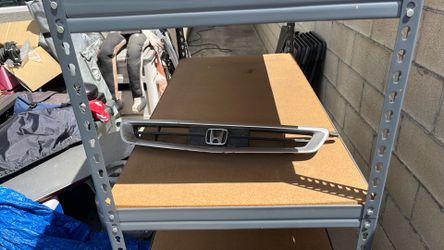 Used genuine OEM Honda front grille for a Honda Civic EK