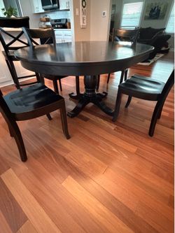Table with 4 chairs & 2 barstools (Black) from Crate & Barrel