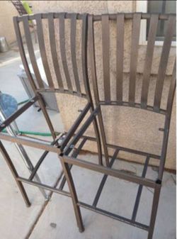 Pair of Heavy Iron Tall Barstools/Chairs. Have the wooden seats to be reattached & reupholstered. These are HEAVY!