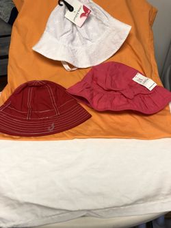 New with tags sun Beach hats $6.00 each Red doesn’t have a chin strap the rest does. Price Firm