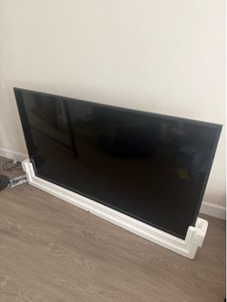 Samsung 65” 4K Smart TV + New Tabletop TV Stand