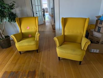 PAIR OF MUSTARD-YELLOW WINGBACK CHAIRS