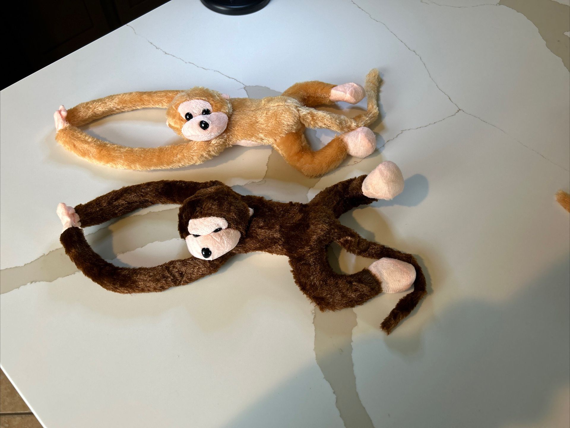 2 monkey huggers