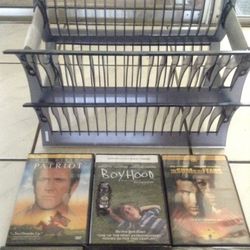 Great DVD's with 1 storage rack. Some unopened. 50 cents- $1.00 each. Good offer takes it all. Call for titles. {contact info removed}.
