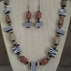   SAFARI BY ROZZARTDESIGNS.  Hand Crafted Polymer 22"  Necklace,  2" Earrings Set.  Surgical Steel French Hook Ear Wires.  