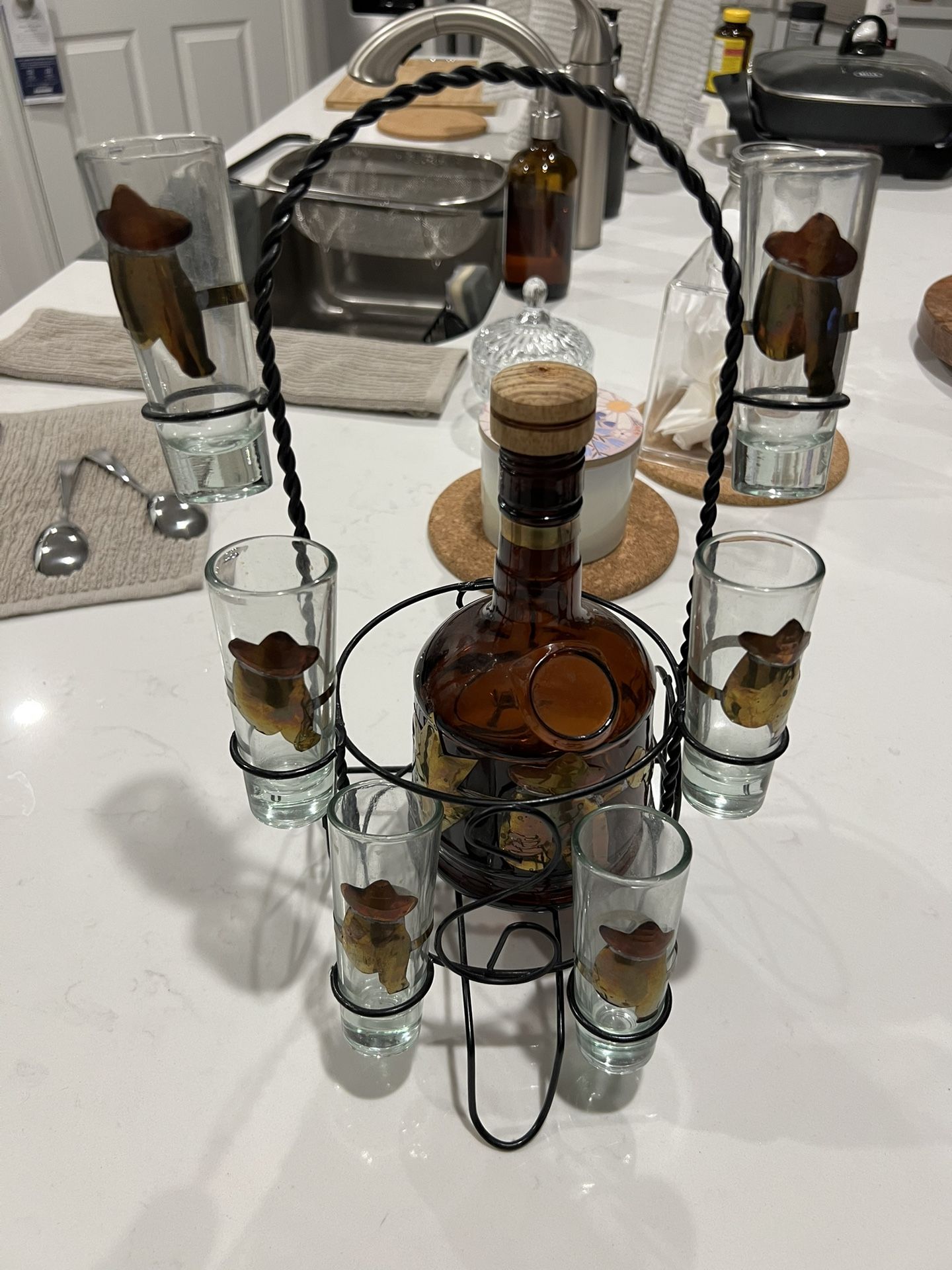 Tequila bottle holder with glass shots