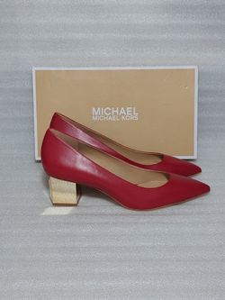 Michael Kors Designer Pumps. New In Box. Beautiful red leather. Block Gold heels. Size 9 women's shoes. Retail $160. Authentic
