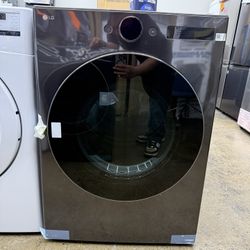 New open box LG 7.4 cu. ft. Vented Stackable SMART Gas Dryer in Black Steel with TurboSteam and AI Sensor Dry Technology