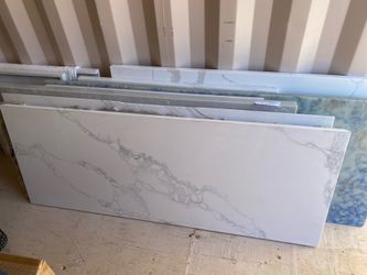 Quartz Countertop 24-1/4”x 62” with a 45 degree cut on the left and right side