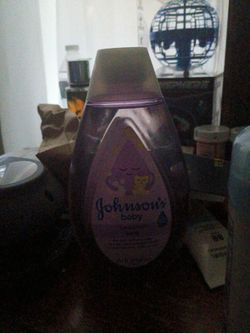 4 bottles of purple baby shampoo